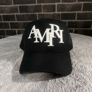 AMIRI Black and White Logo Trucker Hat